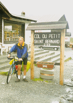 A damp, but happy cyclist on the French-Italian border