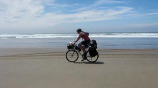 Biking on the beach along the Oregon Coast