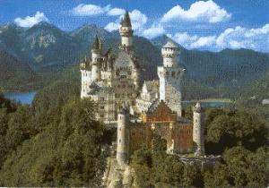 The towers and spires of Neuschwanstein Castle soar above the bike paths of Fuessen in Bavaria