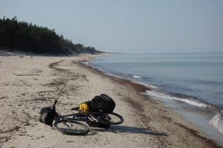 final offroad cycling on the beach of Baltic Sea